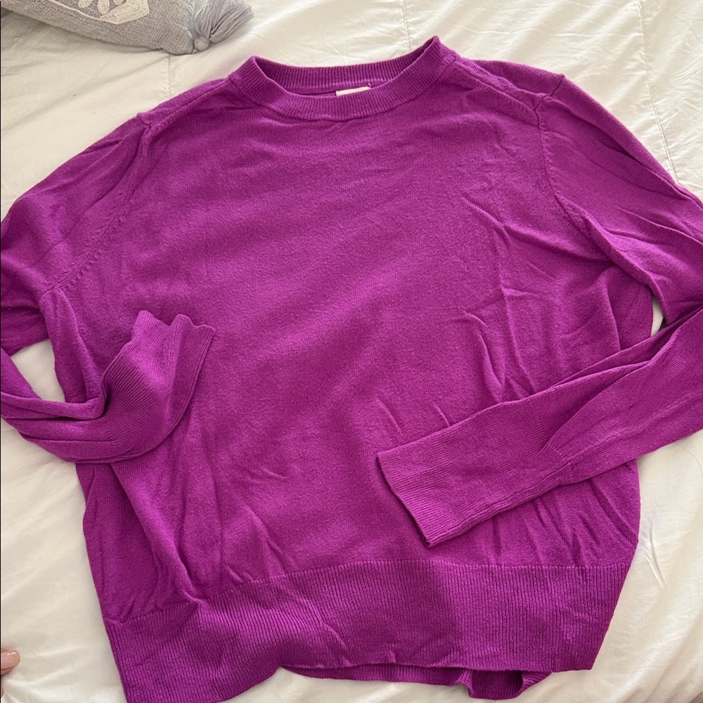 A new day light sweater